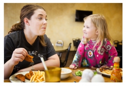 Nora convinces Marie to take another bite.