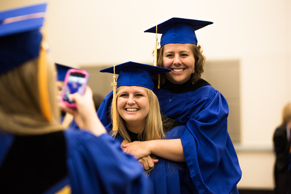 Graduates take photos to share on social media