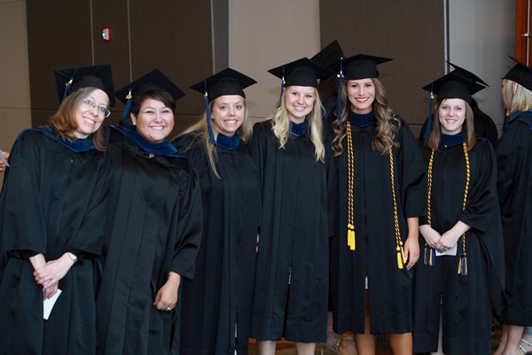 Friends celebrate following commencement