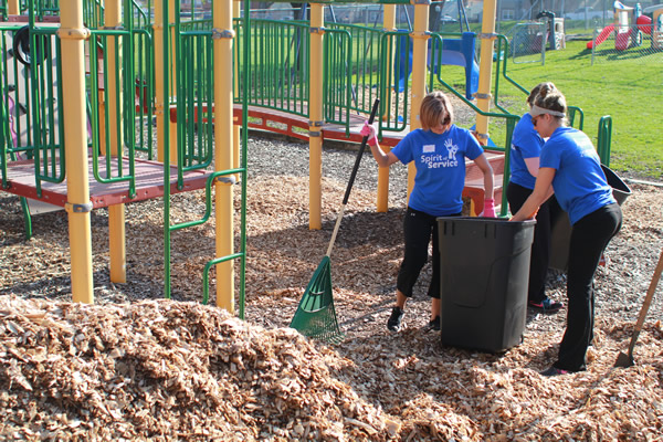 College of Saint Mary Spirit of Service Team Members Working at the Kids Can Community Center